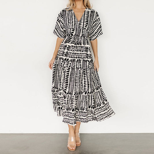 👗Dámské šaty s výstřihem do V a splývavým střihem